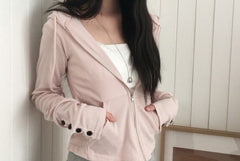 Butterfly sleeve hooded knit sweater in Pink, hands in pockets