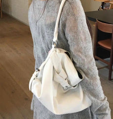 Vintage motorbike leather shoulder bag in White, side view
