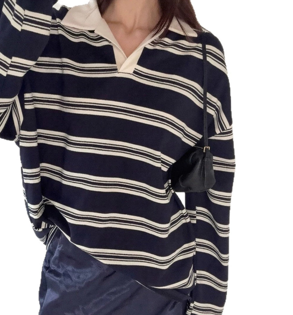 Striped polo collar shirt in Navy Blue, angled view