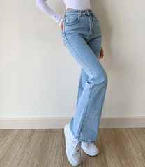 V-neck Blouse + Flare Jeans + Leather Shoulder Bag